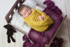 Portraits naissance Ardennes photo bébé petit lit